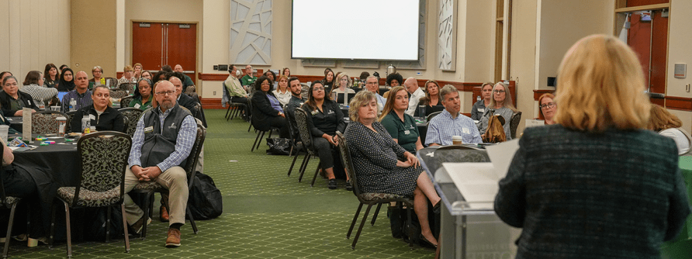 attendees in a conference room
